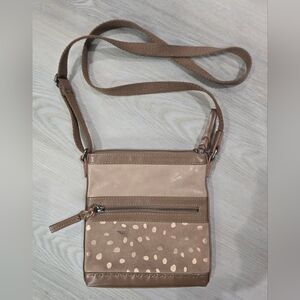 The Sak Pax painted leather crossbody bag with a polka dot design Mark On Front